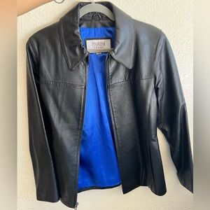 Wilson’s leather jacket w/ blue silk lining